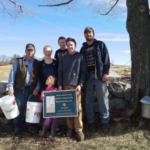 5 generation Abbott Farm in Moultonborough with their new NHMPA sign