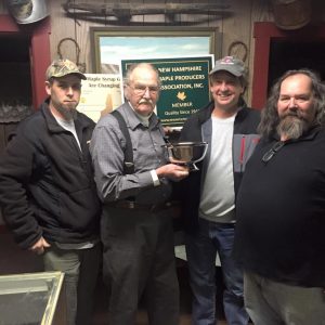 Presentation of the engraved Carlisle Cup to Bentons Sugar Shack at the regional meeting in Orford